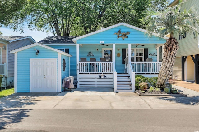 6001-Q21 S Kings Hwy, Myrtle Beach, SC 29575 - bungalow-style house featuring a porch, a ceiling fan, and an outbuilding