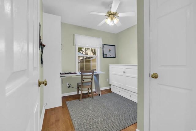 6001-Q21 S Kings Hwy, Myrtle Beach, SC 29575 - home office featuring a ceiling fan and wood finished floors