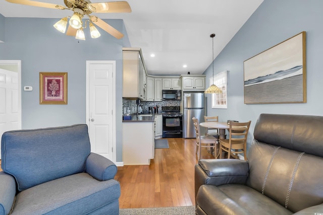 6001-Q21 S Kings Hwy, Myrtle Beach, SC 29575 - living room with wood finished floors, ceiling fan, and recessed lighting