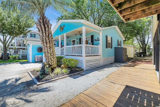 6001-Q21 S Kings Hwy, Myrtle Beach, SC 29575 - view of front of house featuring a porch and a ceiling fan