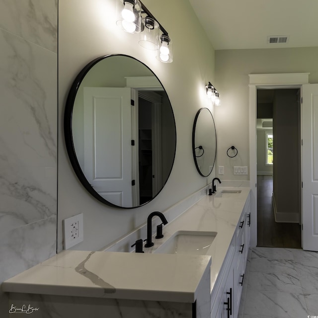 287 W Palms Dr, Myrtle Beach, SC 29579 - full bath featuring double vanity and marble look tiles