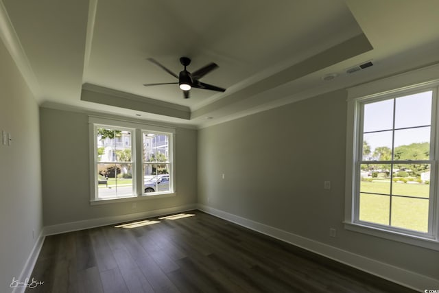 287 W Palms Dr, Myrtle Beach, SC 29579 - empty room with a raised ceiling, healthy amount of natural light, ornamental molding, ceiling fan, and dark wood finished floors