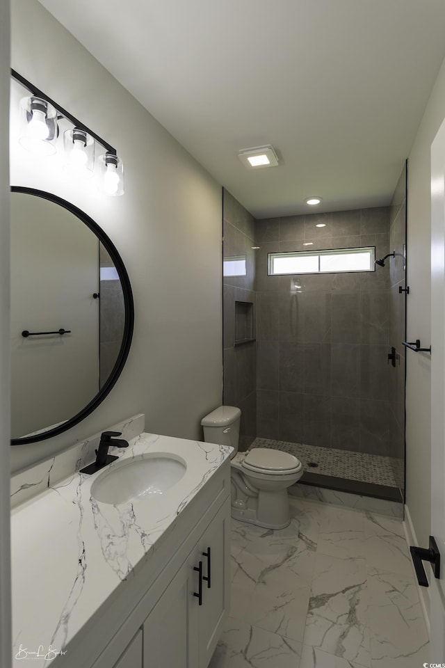 287 W Palms Dr, Myrtle Beach, SC 29579 - bathroom featuring vanity, a tile shower, and marble finish flooring