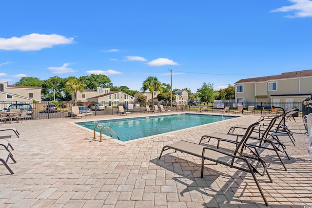 800 9th Ave S Unit N-1, North Myrtle Beach, SC 29582 - community pool featuring a patio and a residential view