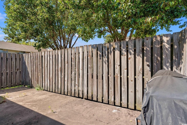 800 9th Ave S Unit N-1, North Myrtle Beach, SC 29582 - fenced backyard with a grill