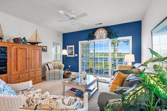 4400 Turtle Ln Unit 2-D, Little River, SC 29566 - living room featuring plenty of natural light, carpet, and ceiling fan