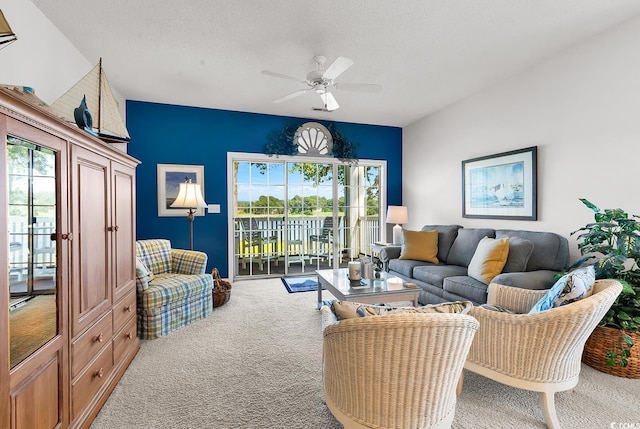 4400 Turtle Ln Unit 2-D, Little River, SC 29566 - carpeted living room with a ceiling fan