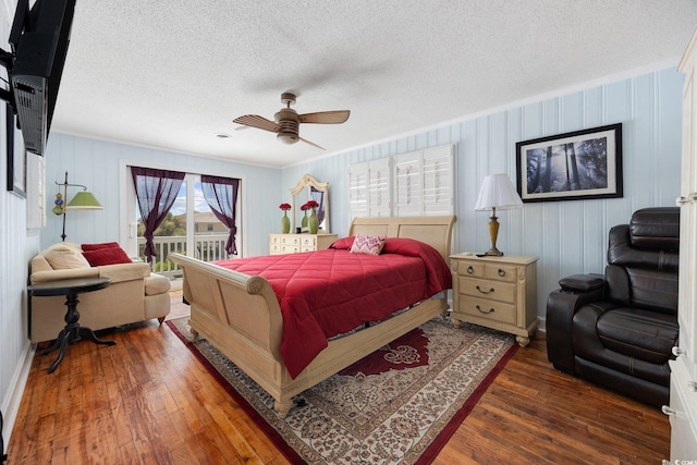 302 46th Ave N, North Myrtle Beach, SC 29582 - bedroom with access to outside, wood-type flooring, a textured ceiling, ceiling fan, and crown molding