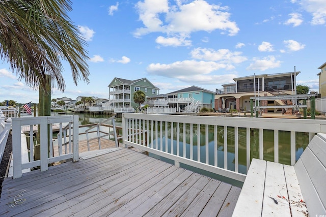 302 46th Ave N, North Myrtle Beach, SC 29582 - wooden terrace featuring a water view and a residential view