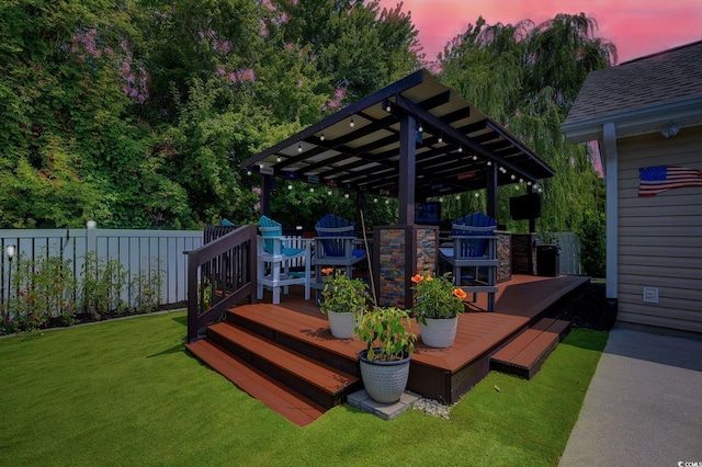 2479 Burning Tree Ln, Little River, SC 29566 - deck at dusk with a pergola and area for grilling