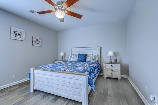 2479 Burning Tree Ln, Little River, SC 29566 - bedroom featuring wood finished floors and a ceiling fan