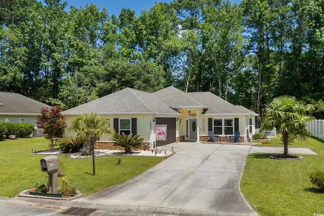 1644 Langley Dr, Longs, SC 29568 - view of front of property with concrete driveway, roof with shingles, and stone siding