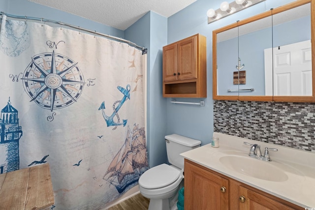 1644 Langley Dr, Longs, SC 29568 - full bath with wood finished floors, vanity, a textured ceiling, tasteful backsplash, and curtained shower