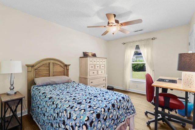 1644 Langley Dr, Longs, SC 29568 - bedroom featuring wood finished floors, a ceiling fan, and an office area