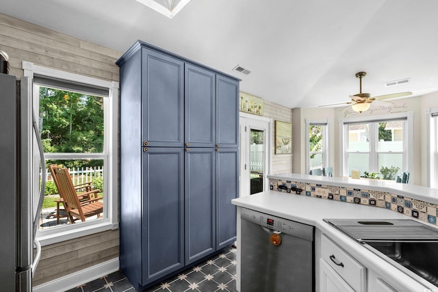 1644 Langley Dr, Longs, SC 29568 - kitchen with appliances with stainless steel finishes, plenty of natural light, light countertops, ceiling fan, and lofted ceiling