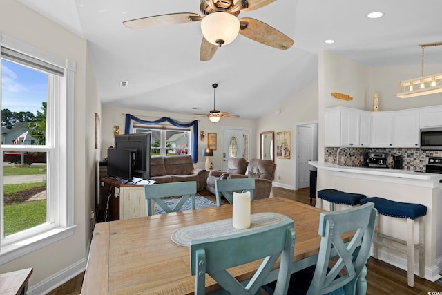 1644 Langley Dr, Longs, SC 29568 - dining space with ceiling fan, vaulted ceiling, dark wood finished floors, and recessed lighting