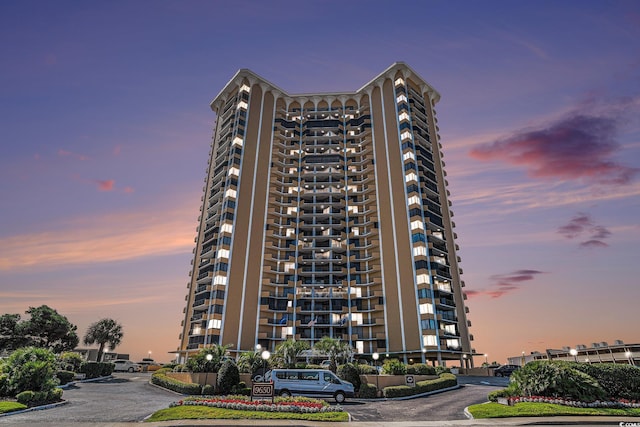 9650 Shore Dr Unit 209, Myrtle Beach, SC 29572 - view of apartment building / complex with uncovered parking
