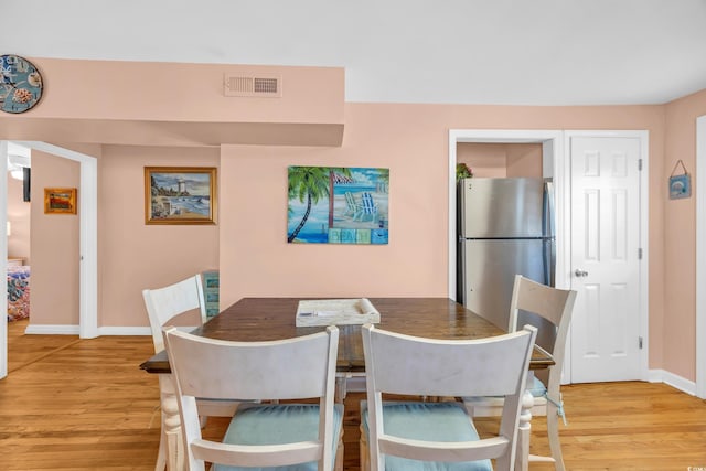 329 54th Ave N, North Myrtle Beach, SC 29582 - dining room with light wood-style floors