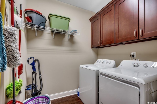 1733 24th Ave N, North Myrtle Beach, SC 29582 - laundry room with washer and dryer, cabinet space, and dark wood finished floors