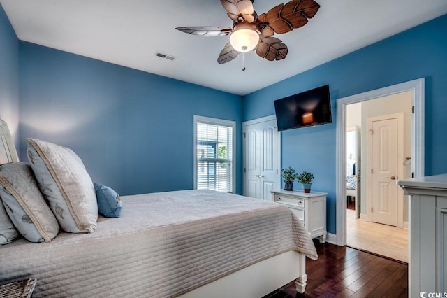 1733 24th Ave N, North Myrtle Beach, SC 29582 - bedroom with dark wood-type flooring, a closet, and a ceiling fan