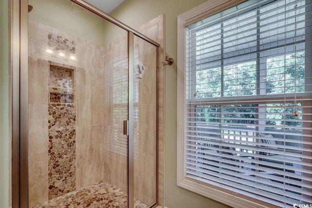 1733 24th Ave N, North Myrtle Beach, SC 29582 - bathroom featuring a stall shower and healthy amount of natural light