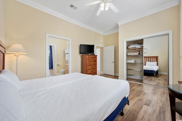 139 Avian Dr Unit 6-201, Pawleys Island, SC 29585 - bedroom with ornamental molding, light wood-style flooring, a closet, ceiling fan, and ensuite bathroom