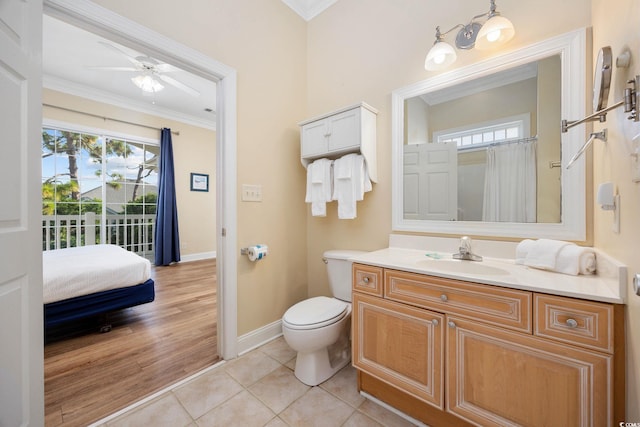 139 Avian Dr Unit 6-201, Pawleys Island, SC 29585 - bathroom with ornamental molding, vanity, plenty of natural light, ceiling fan, and tile patterned floors