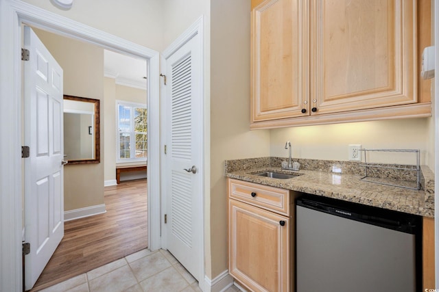 139 Avian Dr Unit 6-201, Pawleys Island, SC 29585 - kitchen featuring dishwashing machine, light brown cabinets, light stone counters, crown molding, and light tile patterned flooring