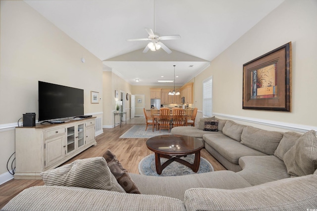 139 Avian Dr Unit 6-201, Pawleys Island, SC 29585 - living room with light wood-type flooring, ceiling fan, and vaulted ceiling