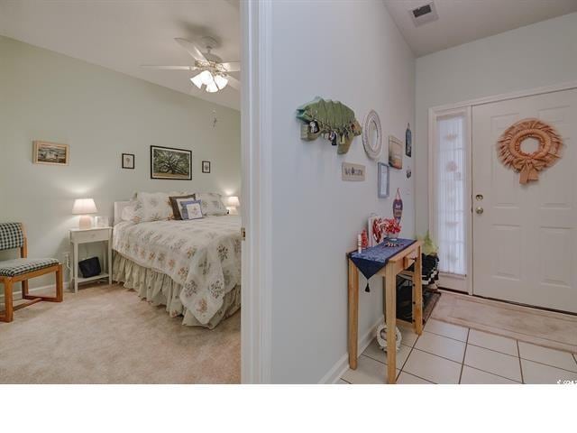 1058 Sea Mountain Hwy Unit 10-101, North Myrtle Beach, SC 29582 - bedroom featuring ceiling fan and light tile patterned flooring