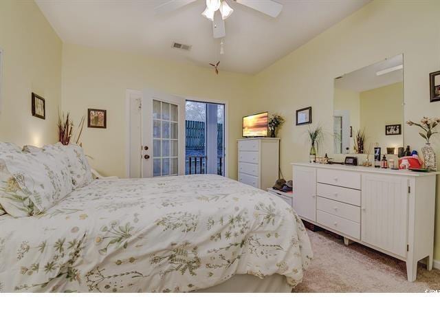 1058 Sea Mountain Hwy Unit 10-101, North Myrtle Beach, SC 29582 - bedroom with access to outside, light carpet, and ceiling fan