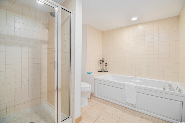 8560 Queensway Blvd Unit 706, Myrtle Beach, SC 29572 - bathroom with a garden tub, a stall shower, tile patterned floors, tile walls, and recessed lighting
