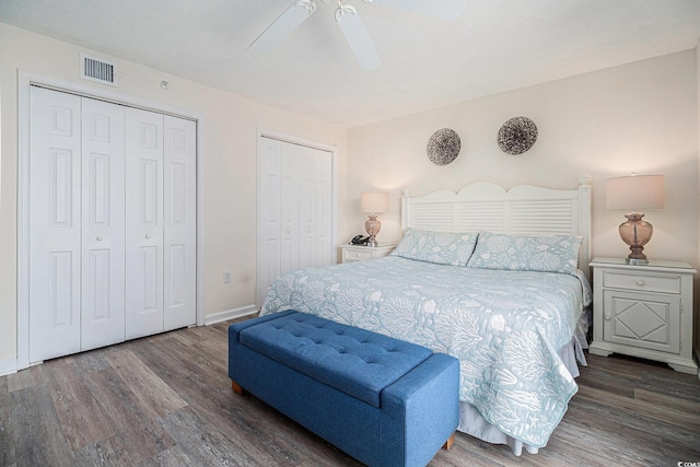8560 Queensway Blvd Unit 706, Myrtle Beach, SC 29572 - bedroom featuring multiple closets, wood finished floors, and a ceiling fan