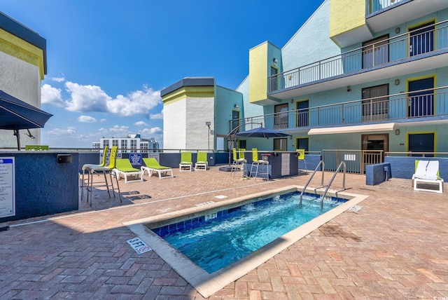 6804 N Ocean Blvd Unit 515, Myrtle Beach, SC 29572 - view of swimming pool with a community hot tub