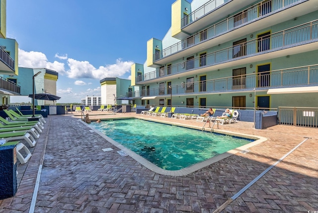 6804 N Ocean Blvd Unit 515, Myrtle Beach, SC 29572 - community pool with a patio