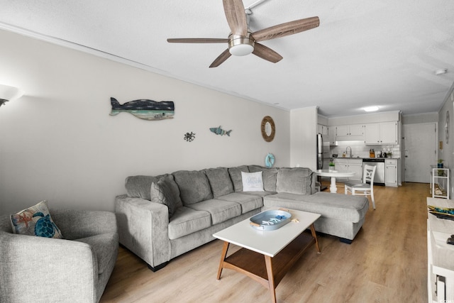 6001 N Ocean Blvd Unit 137, North Myrtle Beach, SC 29582 - living area with ceiling fan and light wood-style flooring