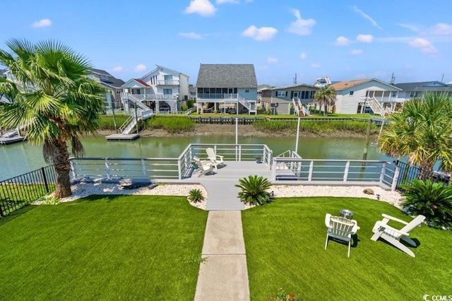 325 N 58th Ave N, North Myrtle Beach, SC 29582 - dock with a water view, a residential view, and boat lift