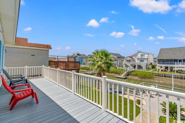 325 N 58th Ave N, North Myrtle Beach, SC 29582 - deck with a water view and a residential view