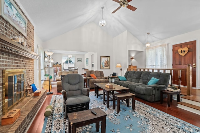 528 George Washington Trl, Georgetown, SC 29440 - living area with wood finished floors, ceiling fan, a fireplace, and high vaulted ceiling