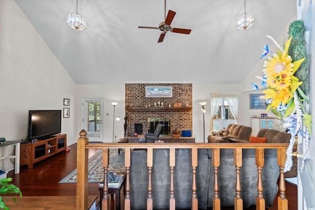 528 George Washington Trl, Georgetown, SC 29440 - living room featuring high vaulted ceiling, a ceiling fan, a fireplace, and wood finished floors