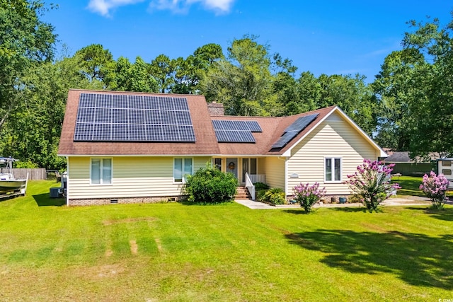 528 George Washington Trl, Georgetown, SC 29440 - rear view of house featuring solar panels, a lawn, crawl space, and a shingled roof