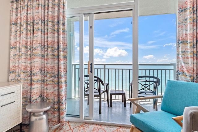 2000 N Ocean Blvd Unit 1206, Myrtle Beach, SC 29577 - sunroom / solarium with healthy amount of natural light and a water view