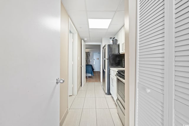 2000 N Ocean Blvd Unit 1206, Myrtle Beach, SC 29577 - hallway with a drop ceiling and light tile patterned floors