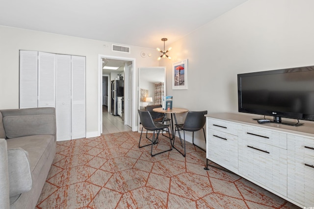 2000 N Ocean Blvd Unit 1206, Myrtle Beach, SC 29577 - living room with a chandelier and baseboards