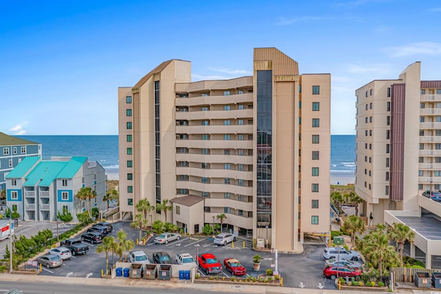 517 S Ocean Blvd Unit 705, North Myrtle Beach, SC 29582 - view of property with uncovered parking and a water view