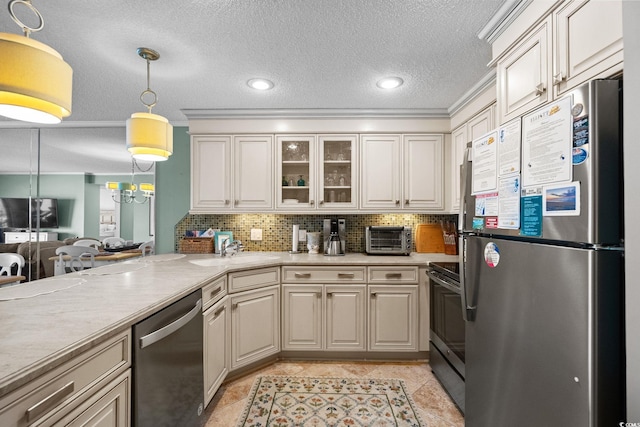 517 S Ocean Blvd Unit 705, North Myrtle Beach, SC 29582 - kitchen with appliances with stainless steel finishes, light countertops, backsplash, recessed lighting, and a textured ceiling