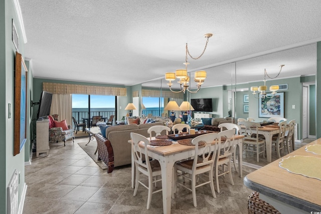 517 S Ocean Blvd Unit 705, North Myrtle Beach, SC 29582 - dining space with a chandelier and a textured ceiling