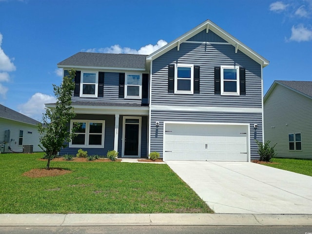 204 Valerio St, Myrtle Beach, SC 29579 - traditional home featuring a front yard, driveway, and an attached garage