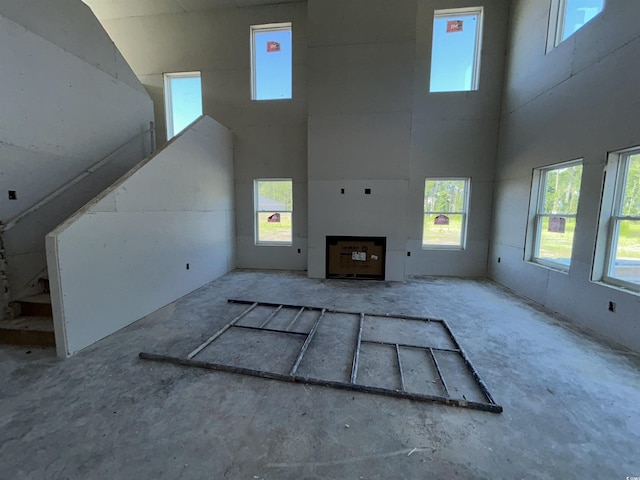 204 Valerio St, Myrtle Beach, SC 29579 - unfurnished living room featuring a towering ceiling and healthy amount of natural light
