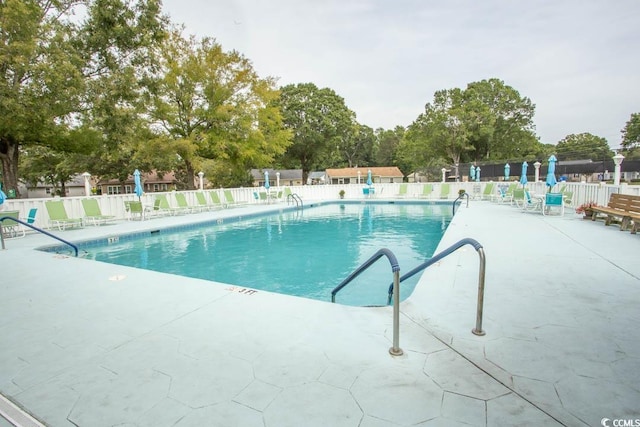 654 Blue Bird Ln, Murrells Inlet, SC 29576 - community pool featuring a patio area